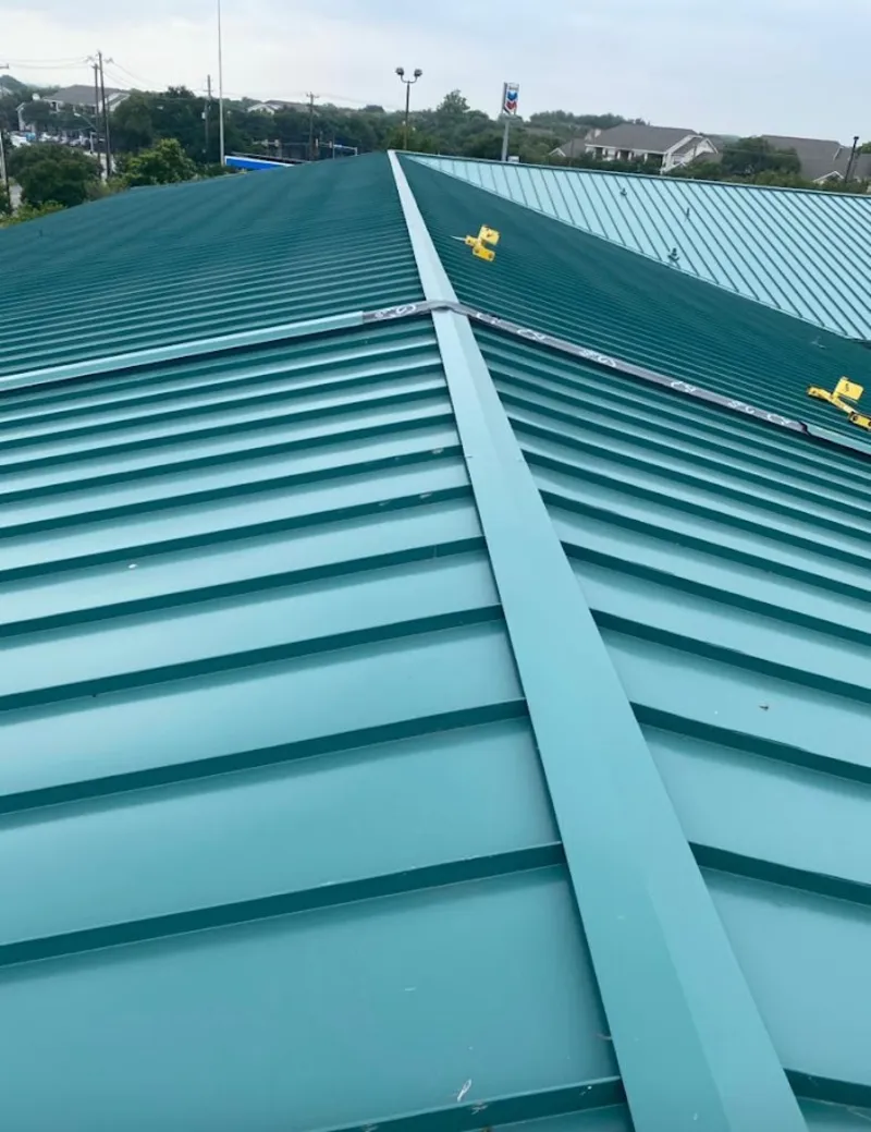 Green commercial metal roof ridge and valley for Metal Roof Repair in Porters Neck
