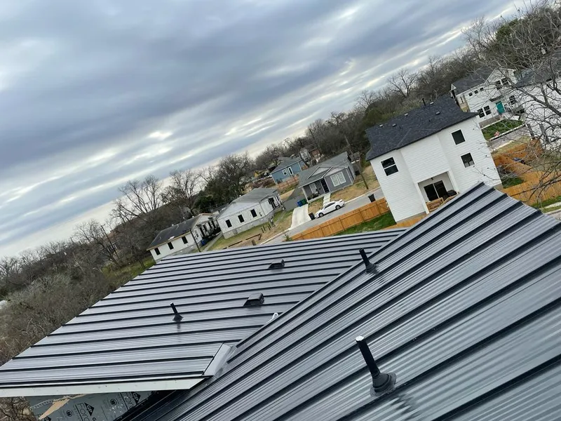 Standing seam metal roof panels with vents for Skylight Repair in Porters Neck